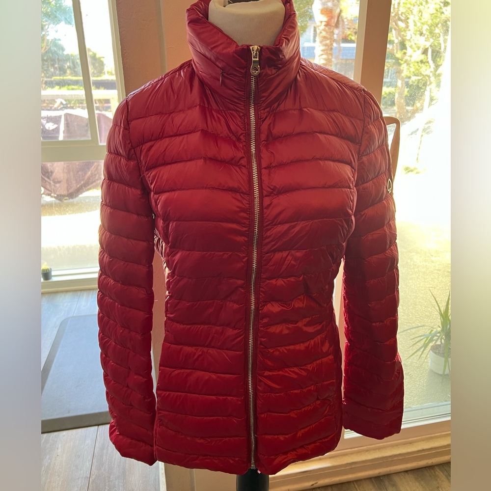 Great Condition, no stains. Small Sleeve needs slight sewing repair